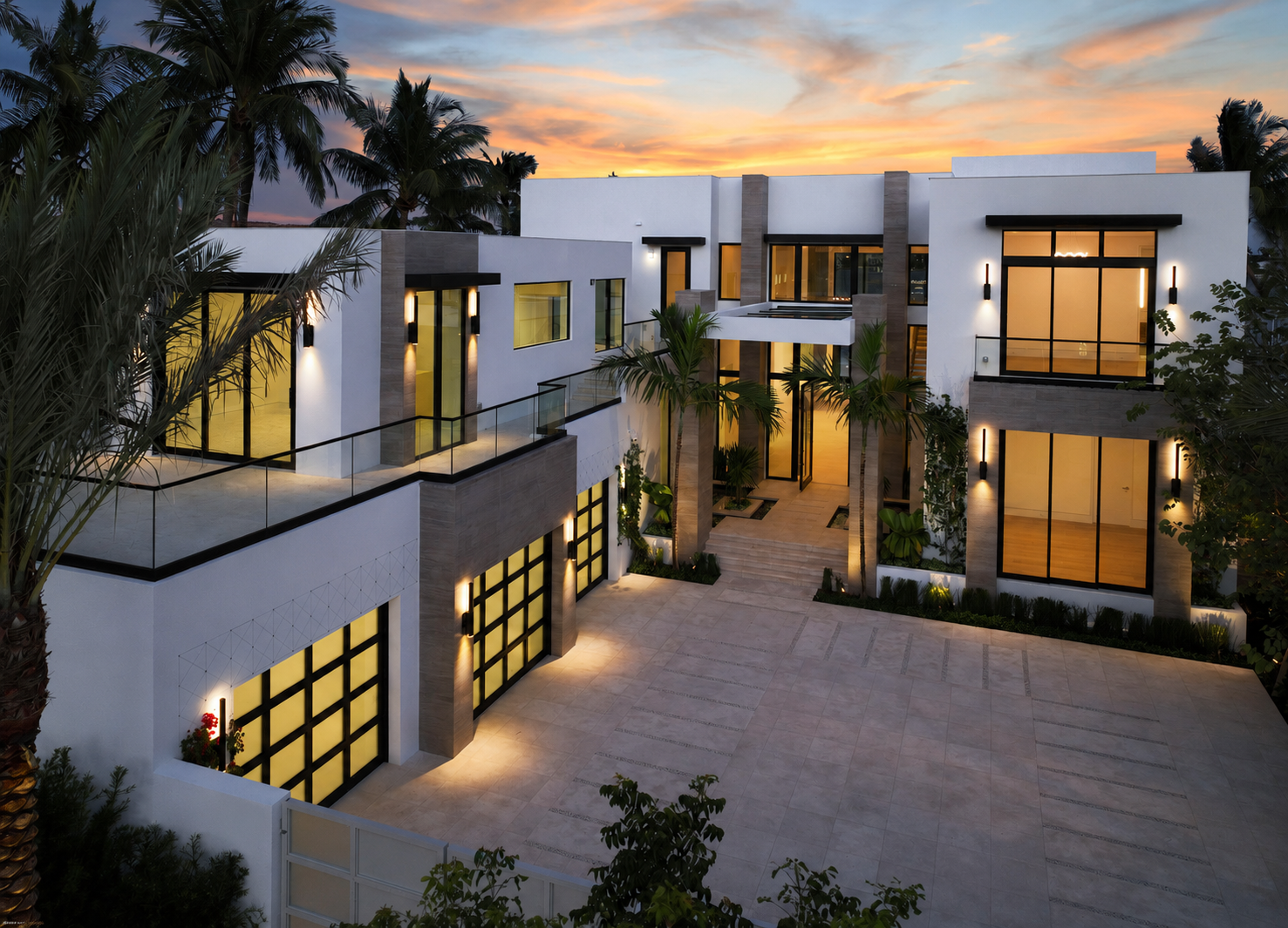 Contemporary waterfront residence in West Palm Beach with sculpted modern architecture at sunset.